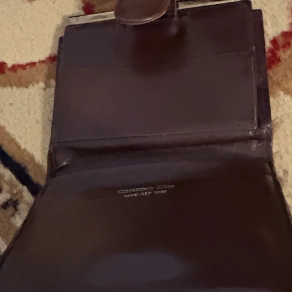 Brown and‎ Tan Patterned Dior trotter wallet